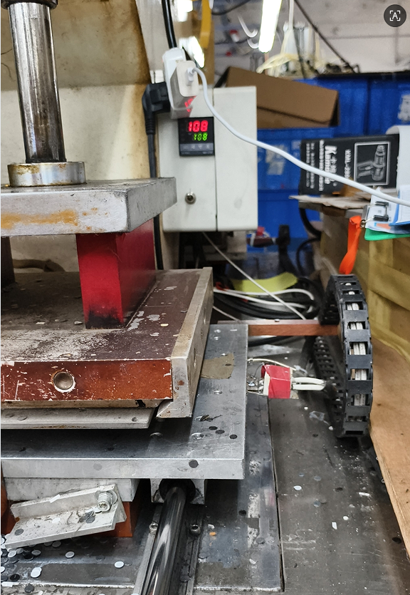 Pictures of Hot Press Equipment in a Factory