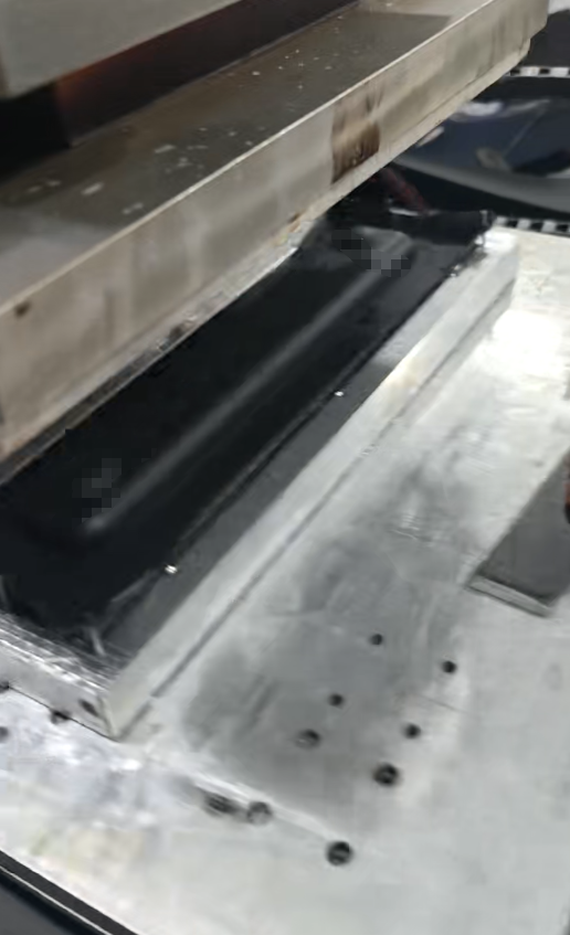 EVA heat-molding process for an action camera hard shell case, used to form the protective shell during OEM prototype and sampling development.
