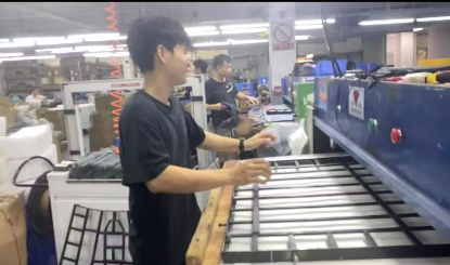 OEM worker preparing layout for custom drone boxes and drone case inserts