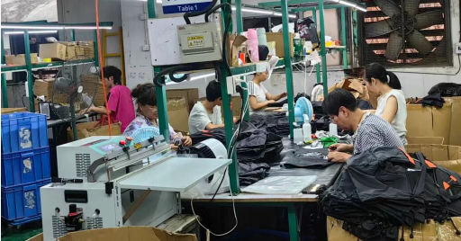 Factory production line for custom drone cases, showing layout control, sewing and inspection during OEM manufacturing.