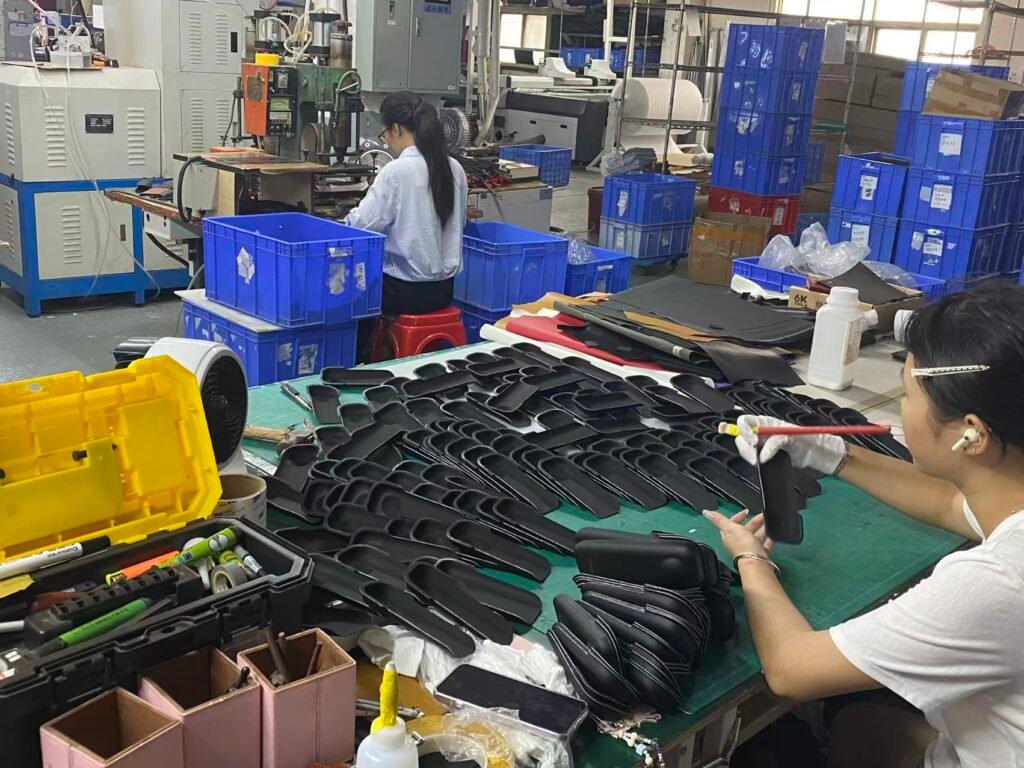 Camera case manufacturing floor checking batch consistency during production
