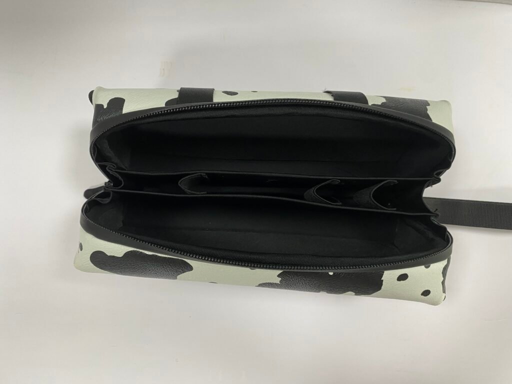 Black padded vlog camera case organizer with a zippered protective structure