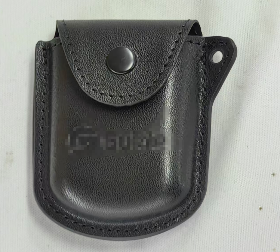 Black leather camera accessory pouch sample with snap closure and stitched edges