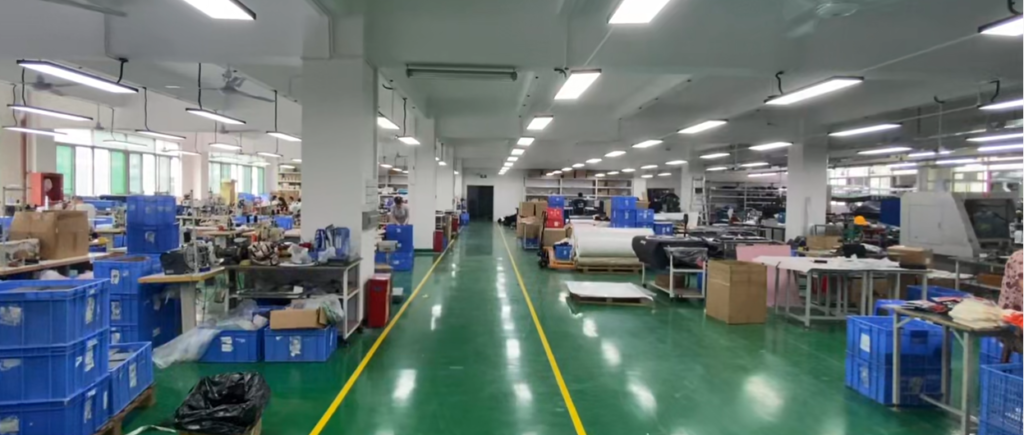 Custom camera case manufacturing workshop with sewing stations and production lines