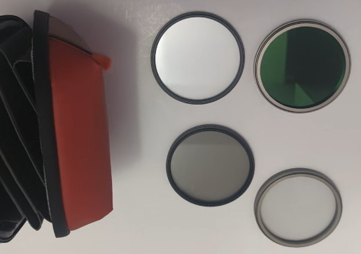 Camera lens filters and pouch used for safe lens care and condensation control
