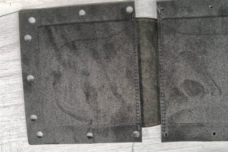 Lens pouch lining and bound edge details for OEM camera lens cases