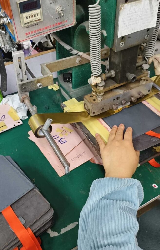 OEM logo pressing process for custom private label camera bags