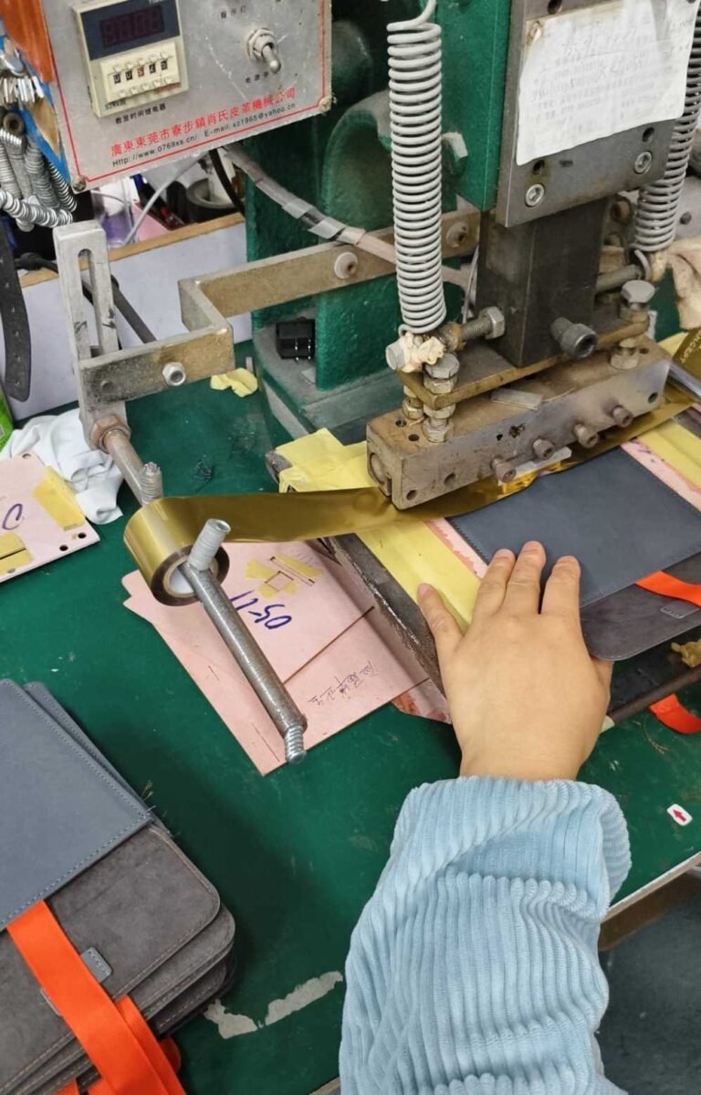OEM logo pressing process for custom private label camera bags